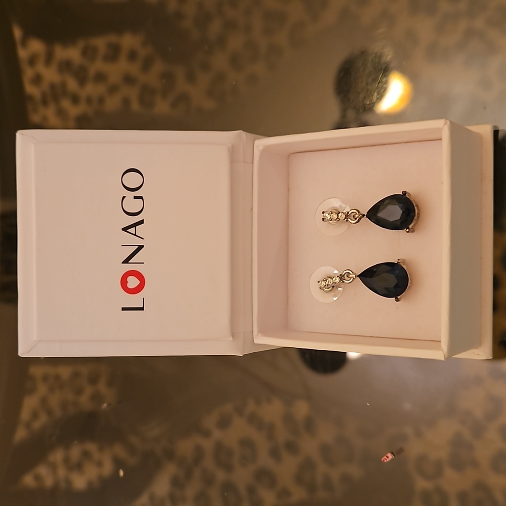 Lonago Dangling Pear Shape Sapphire Earrings.   New